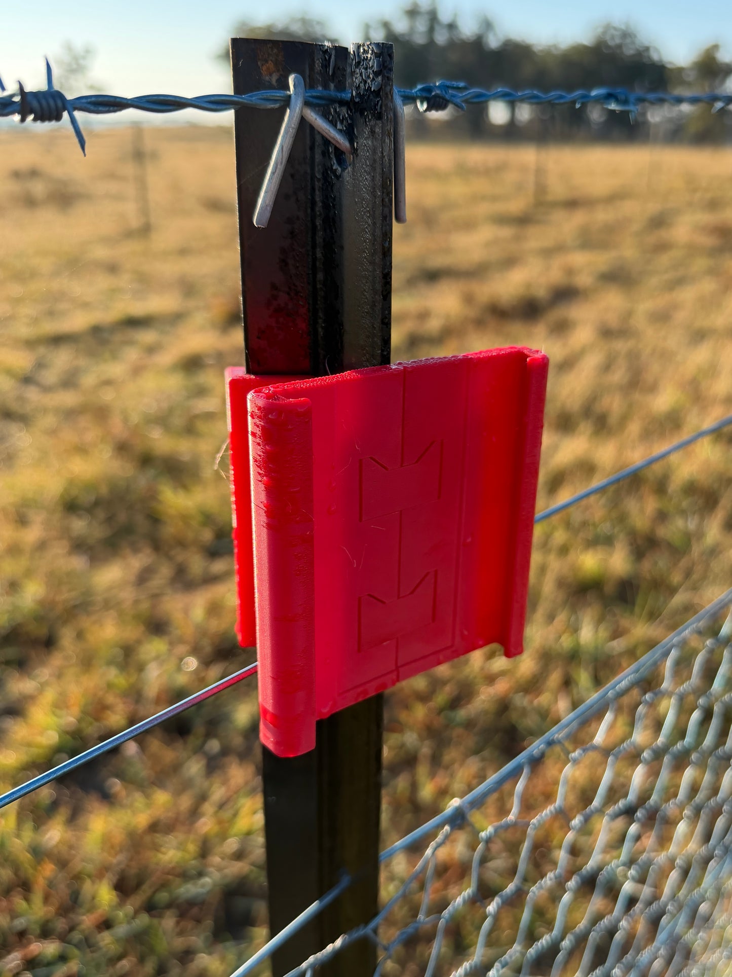 Rain Gauge mounted on farm fence post – bracket