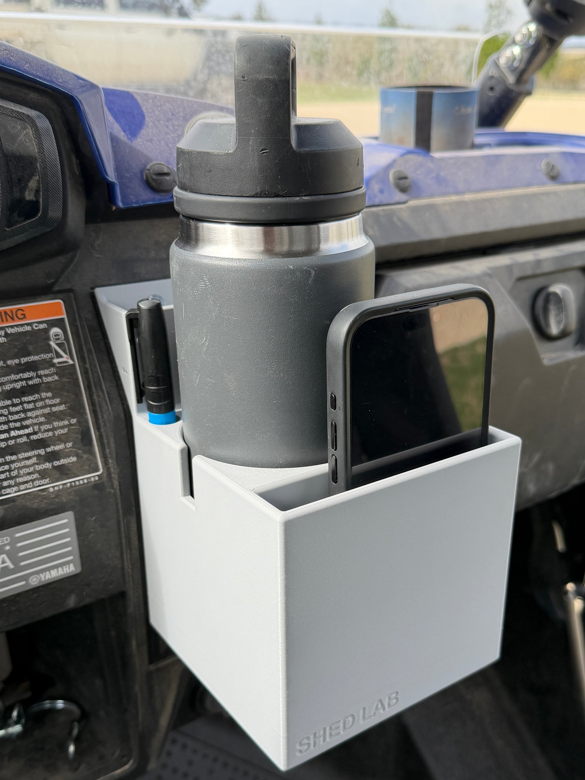 Bottle Holder mounted on Yamaha Viking dashboard
