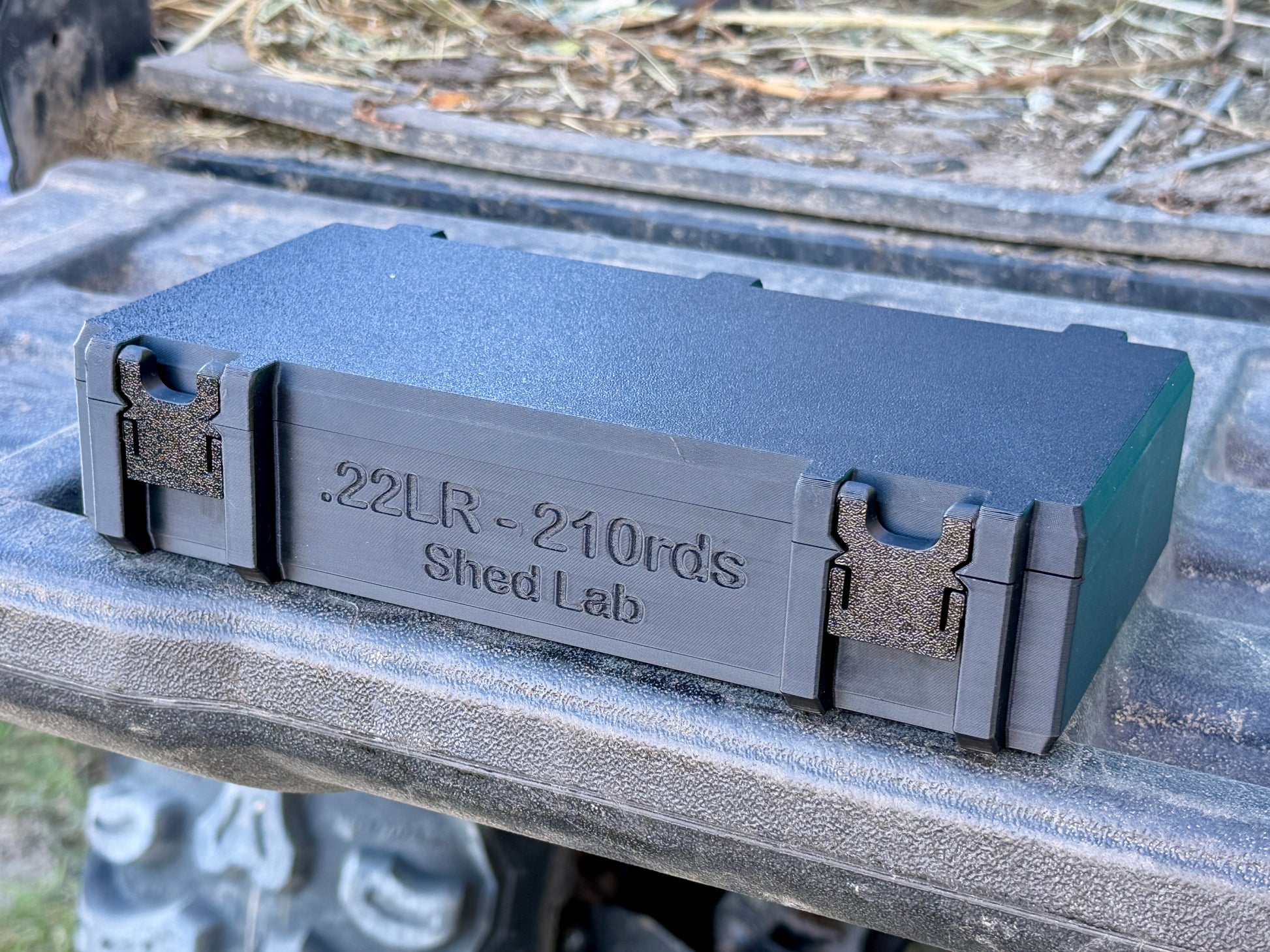 22LR ammunition storage box holding 210 rounds with upright cartridge slots and secure latch
