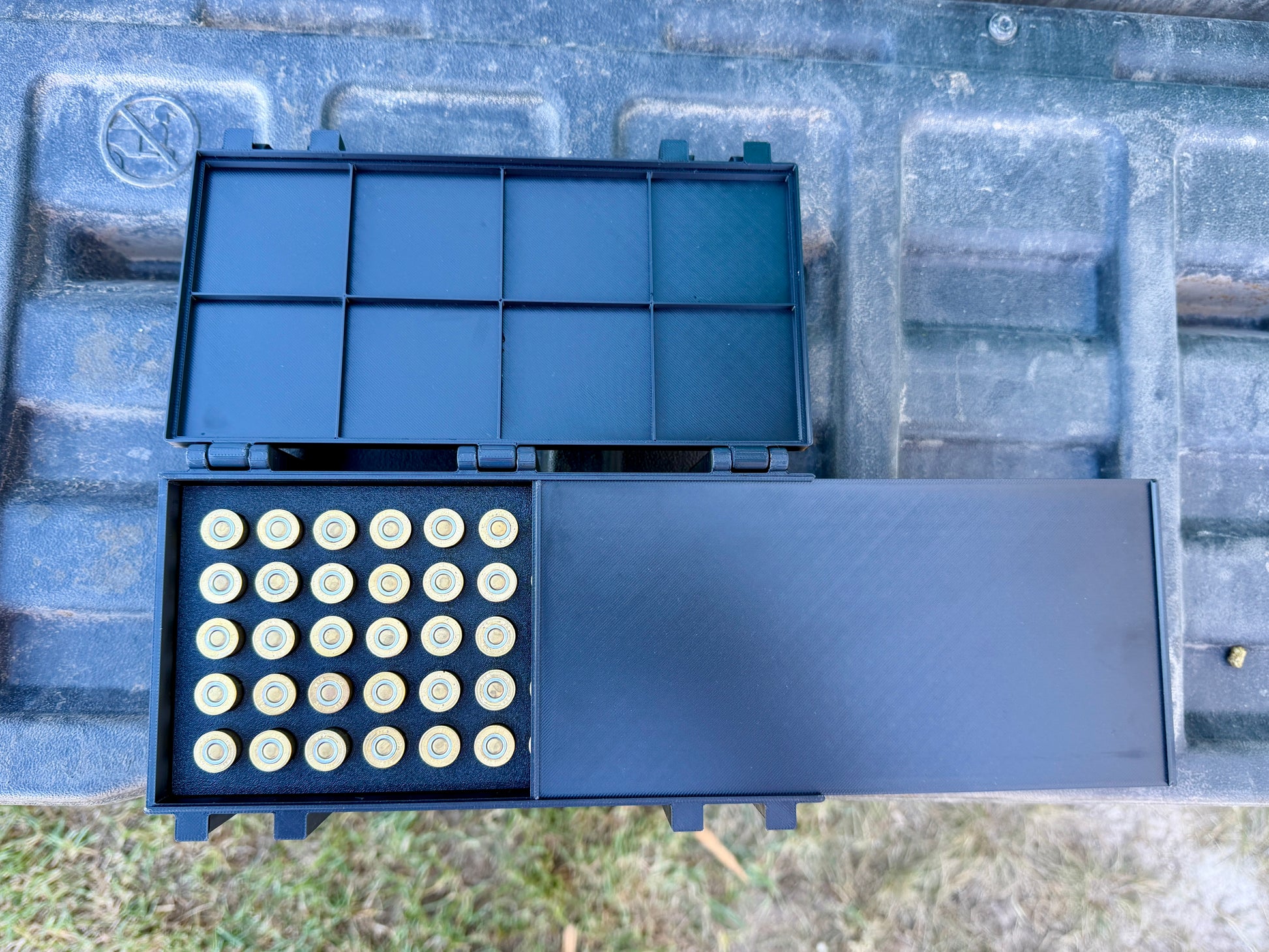 Top view of 410 ammunition box showing upright shell storage slots