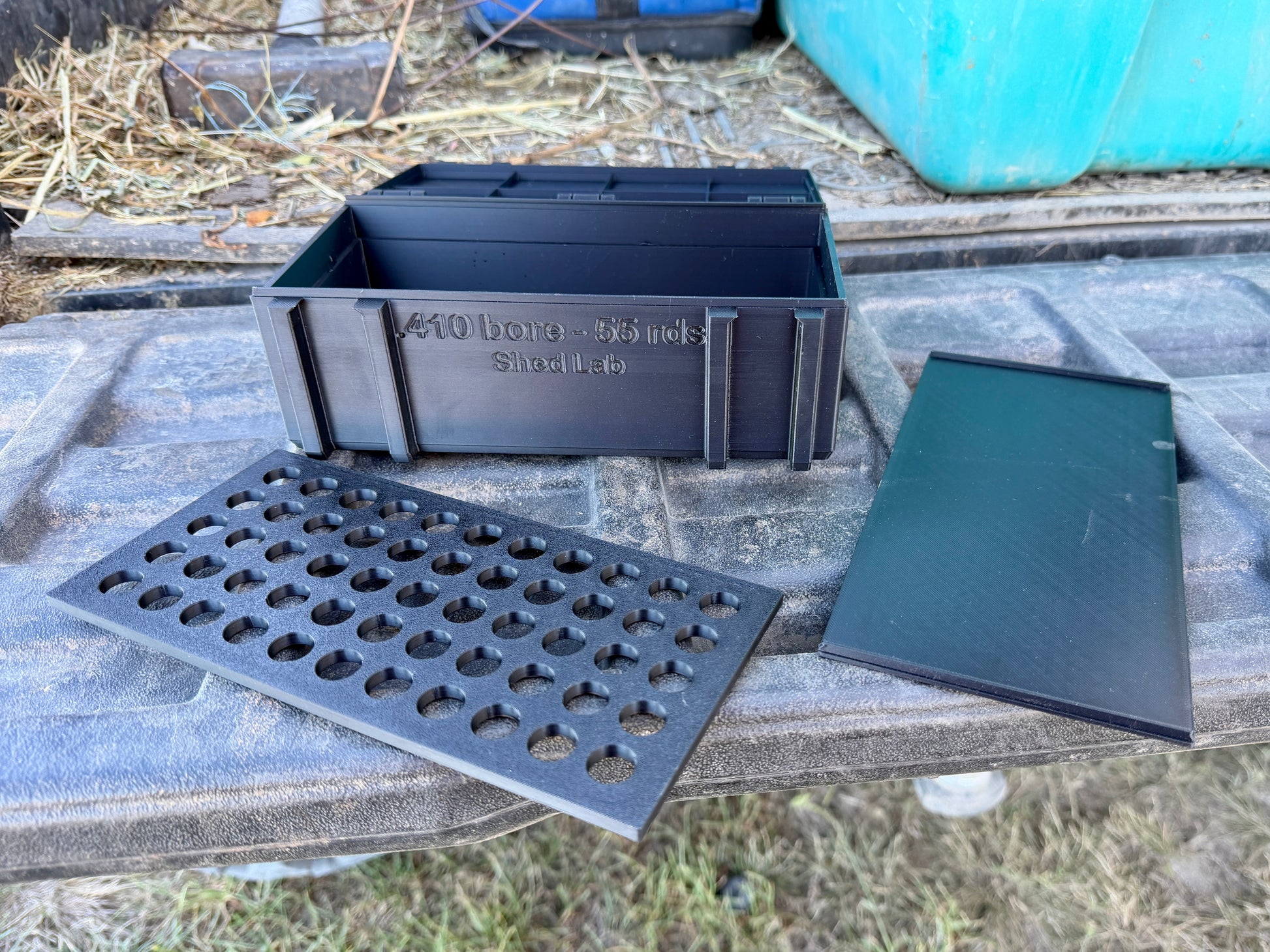 Compact 410 shotgun ammunition case holding 55 rounds