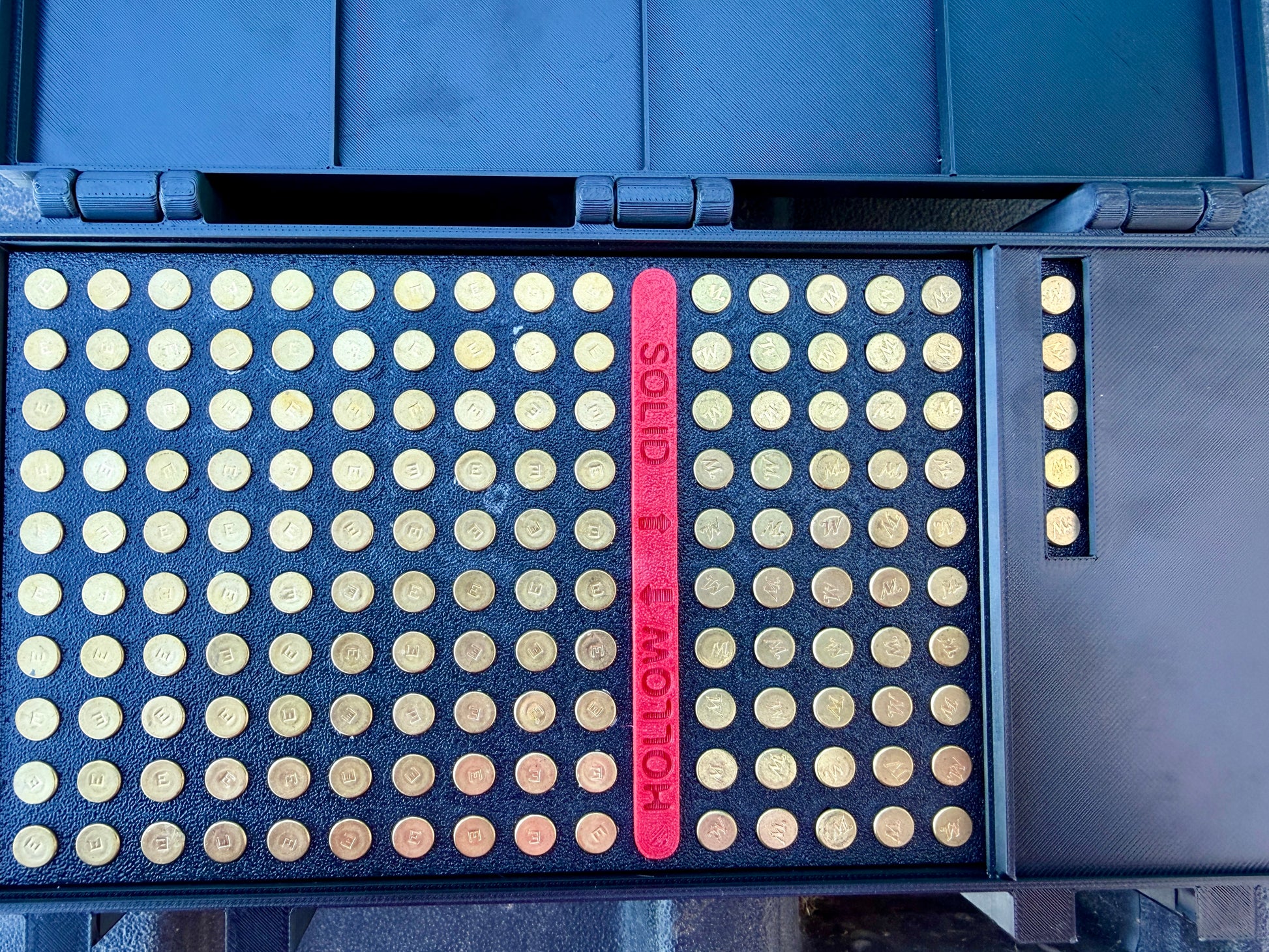 Close-up of upright cartridge slots inside the 22LR ammunition organiser